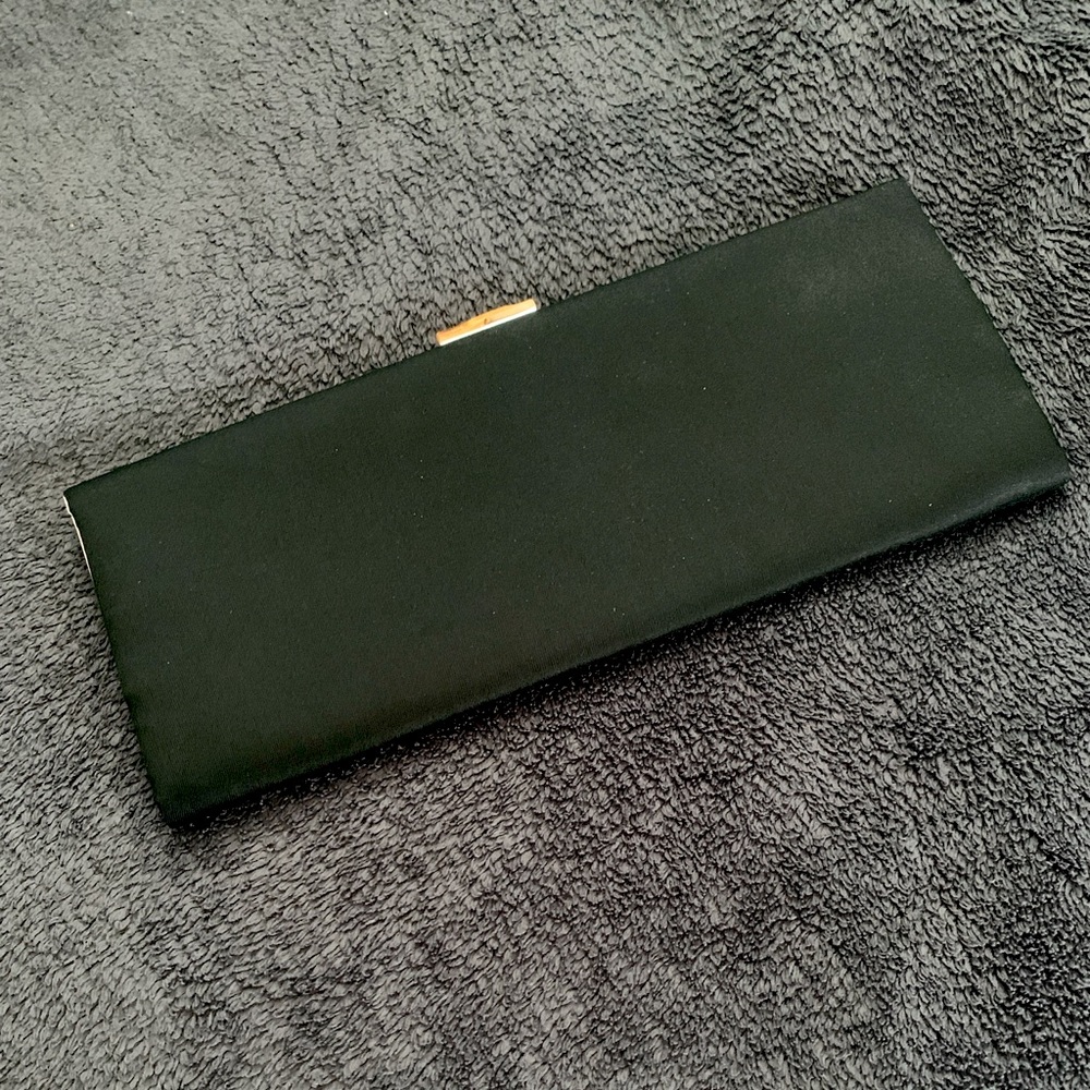 Banana Republic thin black clutch with bamboo clasp and silver tone hardware